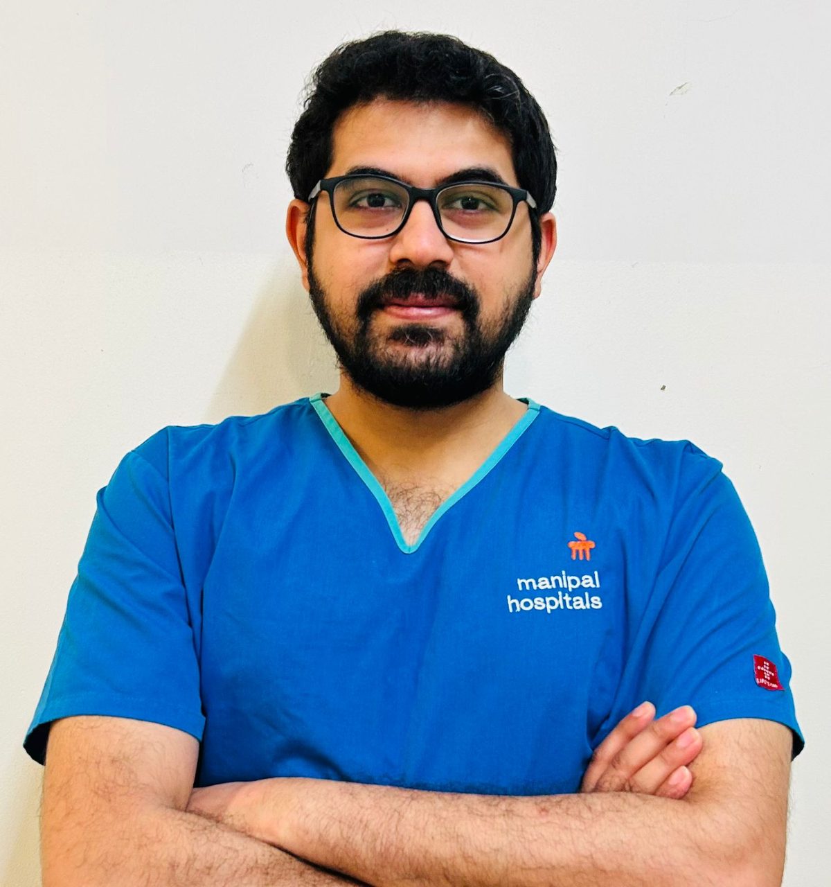 Dr. Subhasish Deb in clinical attire, Manipal Hospitals
